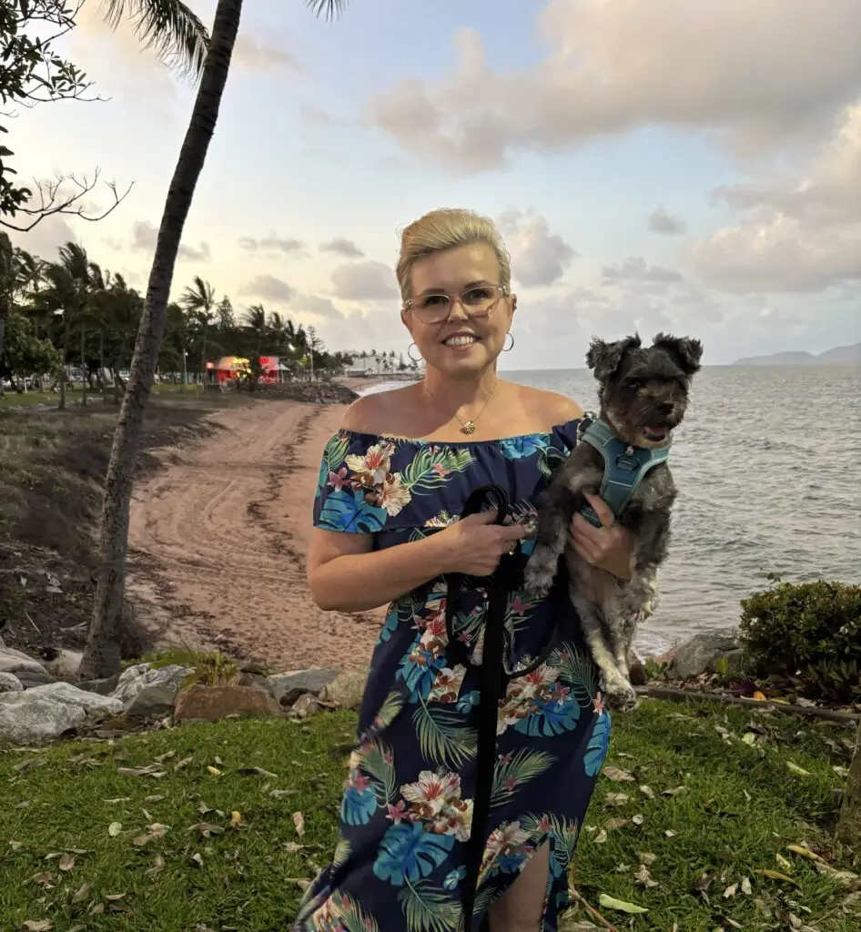 Megan and her dog Xena by the beach